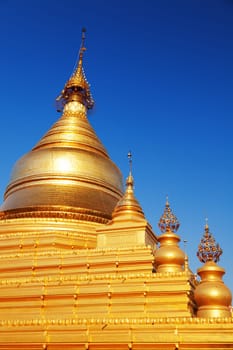 The Maha Lawka Marazein Pagoda at the center of the Kuthodaw Pagoda. Kuthodaw Pagoda is a Buddhist stupa, located in Mandalay, Burma (Myanmar), that contains the world's largest book. It lies at the foot of Mandalay Hill. In the grounds of the pagoda are 729 stone-inscription caves, each containing a marble slab inscribed on both sides with a page of text from the Tipitaka, the entire Pali Canon of Theravada Buddhism. Pagoda Kuthodaw stretching from 1860 to 1868 during the reign of King Mindona.