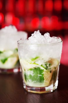 Caipirinha cocktail comes from Brazil and is considered a characteristic drink of the country. It's simplicity, sweetness and popularity all over the world has made it one of the 50 greatest drinks of all time...It's name is derived from the word &quot caipira&quot wich refers to someone from the contryside. It's Portuguese name is feminine, meaning &quot country girl&quot . ..Original Caipirinha is made of