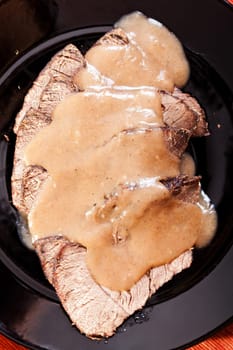 Horse meat, stewed with mushroom sauce