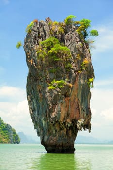 Khao Phing Kan is a pair of islands on the west coast of Thailand, in the Phang Nga Bay, Andaman Sea, near Phuket. About 40 metres from its shores lies a 20 meters tall islet Ko Tapu or Khao Tapu. The island is a part of the Ao Phang Nga National Park. Since 1974, when it was featured in the James Bond movie The Man with the Golden Gun, it is popularly called James Bond Island.