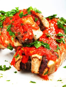 Stuffed eggplants with meat and tomato sauce