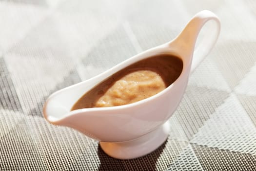Mushroom sauce in gravy boat