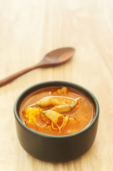 Spicy sour soup vegetable on wooden background, Food summer season