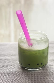 Green tea, famous drink on grunge background