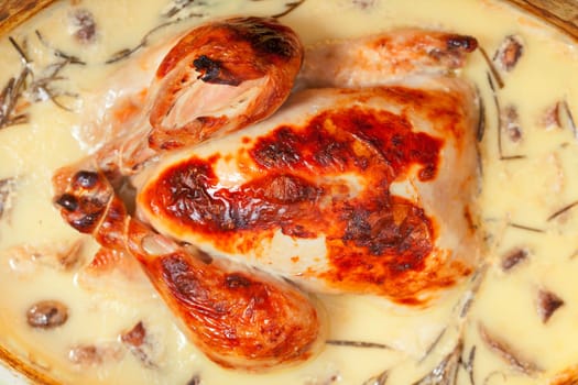 Chicken pot stewed with milk, rosemery and mushrooms
