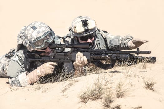 United States paratroopers airborne infantrymen in action in the desert