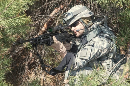 United States airborne infantry marksman in action