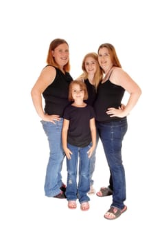 Two family's, two mothers and two daughters standing isolated, all in.jeans, for white background..