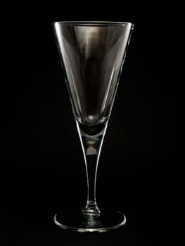 Empty Champagne Flute isolated on black
