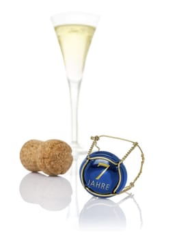 Champagne lid with the inscription 7 years