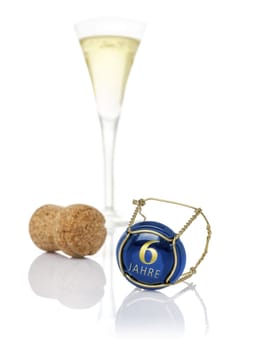 Champagne lid with the inscription 6 years