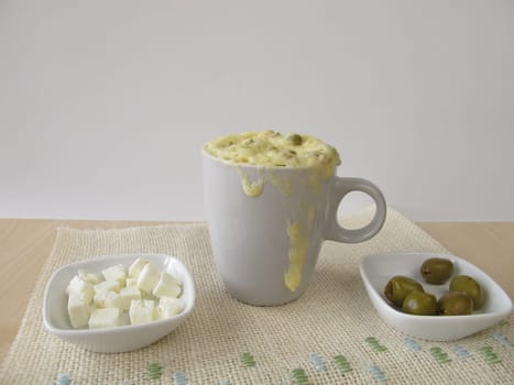 Homemade Mug Cake with olives and feta cheese
