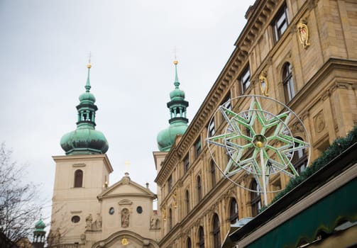 christmas star on a food stall in the city center of prague