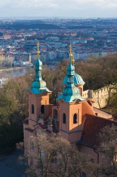 view on cathedral of saint lawrence in prague, czech republic. It was originally a Romanesque church, later rebuilt in Baroque style by Kilian Ignaz Dientzenhofer.