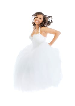 Young bride with jumping barefoot isolated on white background
