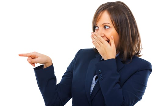 Businesswoman pointing and secretly laughing isolated on white background