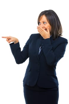 Businesswoman pointing and secretly laughing isolated on white background