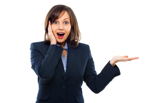 Businesswoman pointing with a hand and showing surprise isolated on white background