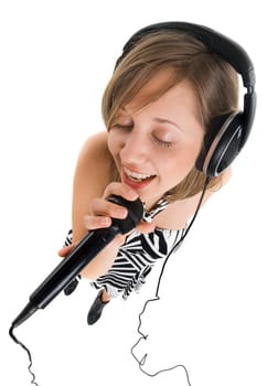 Wide angle shot of girl singing with microphone