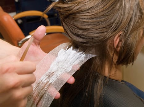 Woman having her hair colored