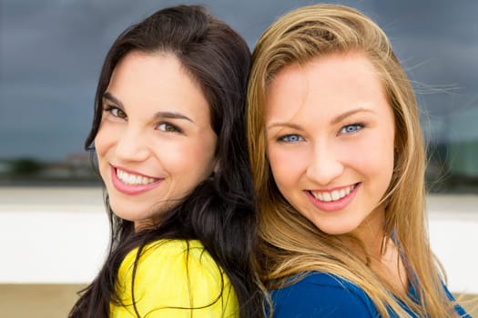 Portrait of a beautiful two young girls smiling