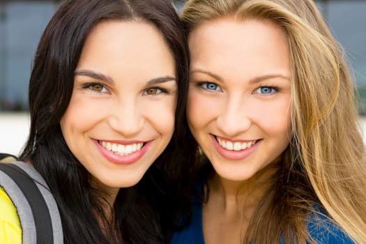 Portrait of a beautiful two young girls smiling