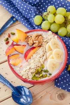 Smoothie Bowl with fresh fruit and oatmeal
