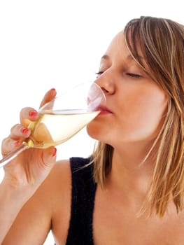 Woman drinking champagne isolated on white