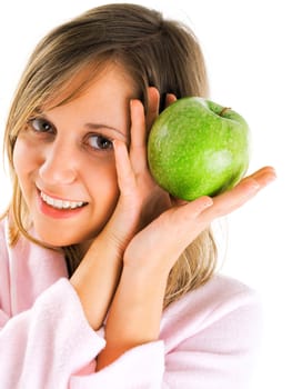 Woman in housecoat with apple
