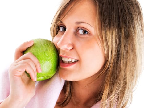Woman in housecoat with apple