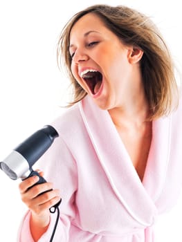 Woman singing with hair dryer