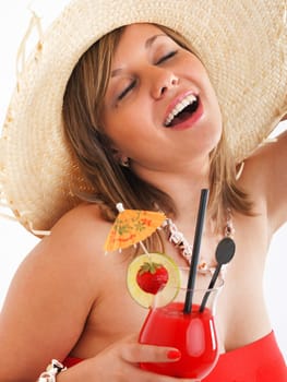 Woman with hat and cocktail