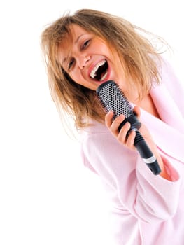 Woman singing with hairbrush