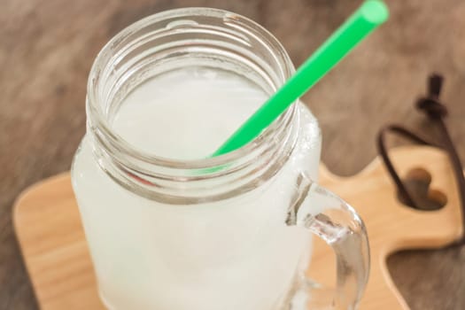 Fresh cold coconut water glass, stock photo