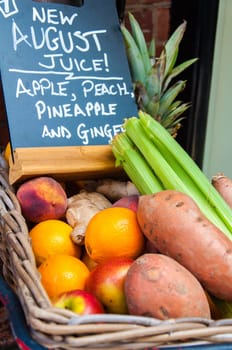 Fresh vegetables and fruits in a basket for juice