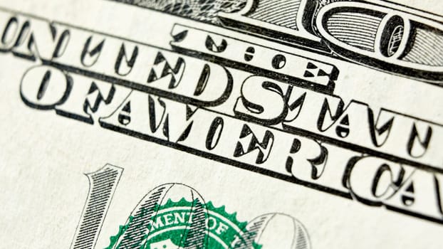 Macro close up of the US 100 dollar bill. Extreme macro. Shallow dof