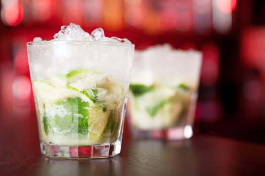 Caipirinha cocktail comes from Brazil and is considered a characteristic drink of the country. It's simplicity, sweetness and popularity all over the world has made it one of the 50 greatest drinks of all time...It's name is derived from the word &quot caipira&quot wich refers to someone from the contryside. It's Portuguese name is feminine, meaning &quot country girl&quot . ..Original Caipirinha is made of