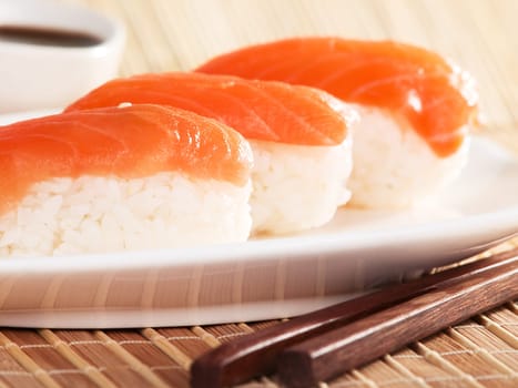 Close up of a portion Salmon nigiri sushi (sake nigiri)