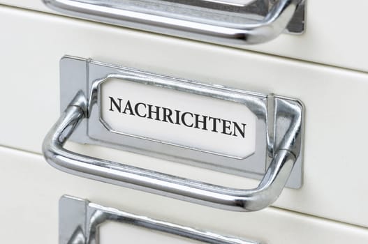 Drawer cabinet with the inscription Messages