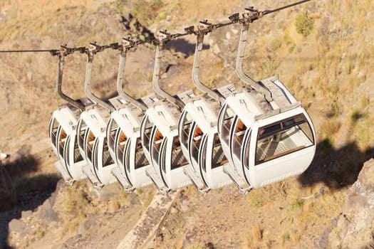 Cable car in Fira is popular for getting at the top of the village from the port, the other two options are by foot or by riding monkeys