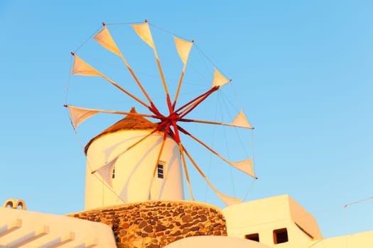 Windmill in Oia, Santorini during a sunny summer day