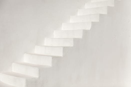 White stairs on a church wall in Oia, Santorini
