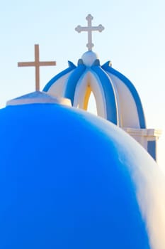 Famous church in Fira, Santorini at sunset