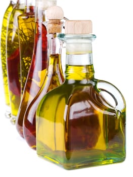 Bottles of olive oil isolated on white