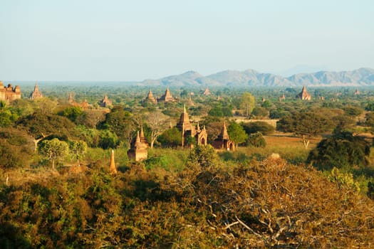 Ancient pagodas in Bagan, blue sky in background