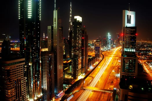 View of Dubai skyline at night from 42th floor terrace of Four Points Sheraton Hotel at Sheikh Zayed Road