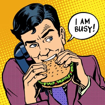 Lunch fast food man eating a Burger and talking on the phone. The theme of the workload at work