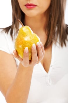 Young woman holding pear in her hands, isolated on white