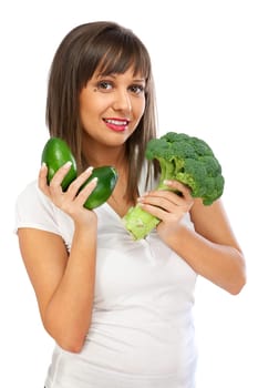 Young woman holding avocado and broccoli isolated on white background