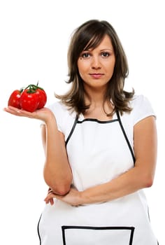 Young woman holding fresh tomatos in hands